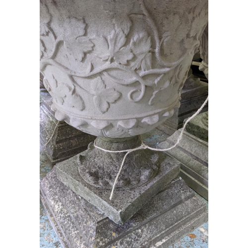 172 - GARDEN URNS, a pair, each 66cm W x 85cm H, in weathered reconstituted stone. (2)