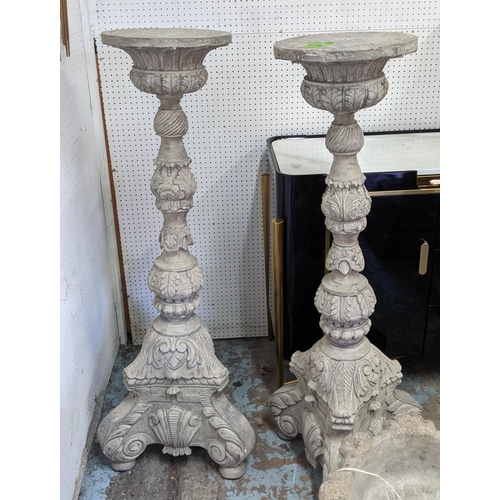 176 - TORCHERES, a pair, each 130cm tall, carved wood, in a grey distressed finish. (2)