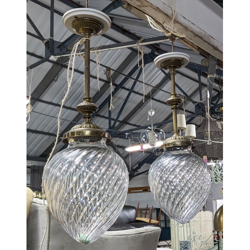 180 - CEILING LAMPS, a pair, each 66cm tall, brass rods with ribbed glass shades. (2)