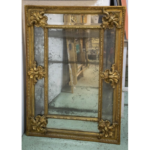 181 - WALL MIRROR, 81cm W x 115cm H, early 19th century Continental, the gilt frame with bevelled borders ... 