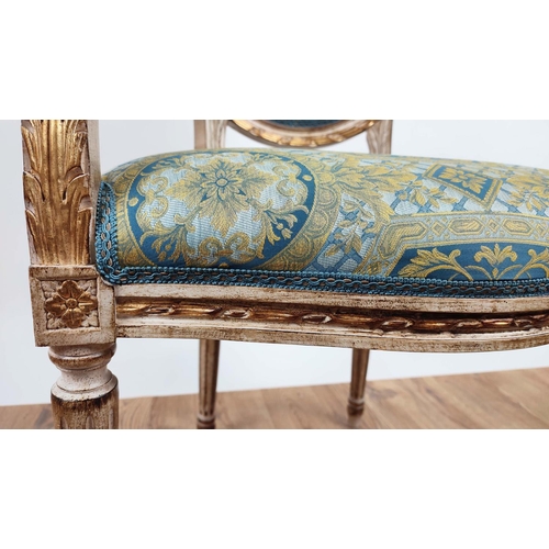 192 - FAUTEUILS, a pair, each 60cm x 101cm H, Louis XVI style with carved showframes and gilt detail in Ve... 