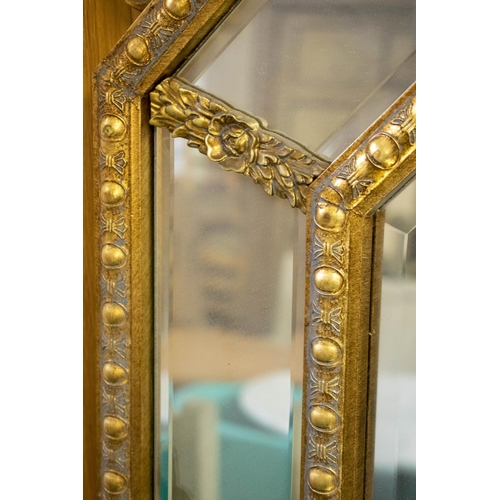 212 - WALL MIRROR, 144cm H x 89cm, French style giltwood with marginal plates and foliage crest.