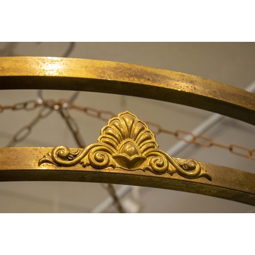 213 - HANGING LIGHT, early 20th century brass with eight glass shades, 112cm x 29cm H excluding chain.