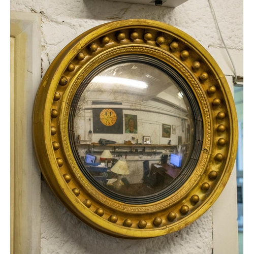 247 - CONVEX MIRROR, 49cm diam., Regency giltwood and gesso frame.