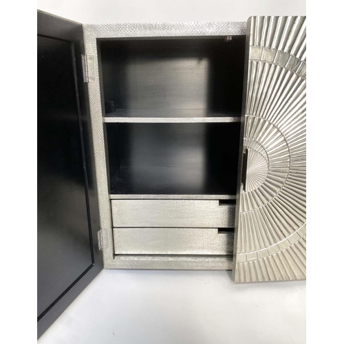 290 - STARBUST CABINET, sivlered metal clad with radiating motif to the two panel doors enclosing shelves ... 