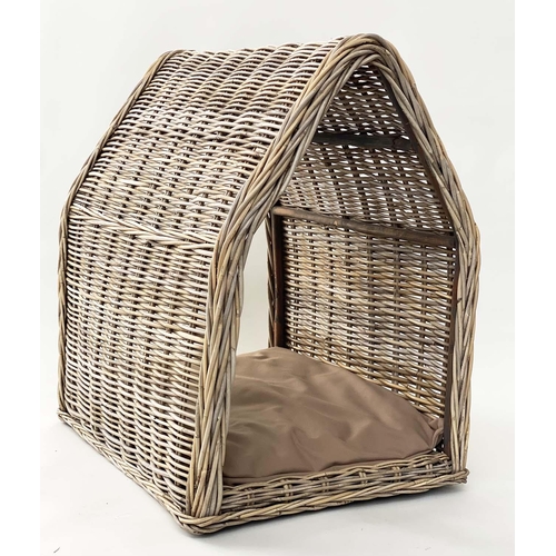 295 - DOG BED, woven heavy duty rattan, arched with cushion, 72cm x 82cm H x 60cm.