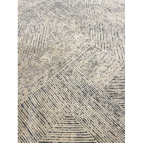 309 - CONTEMPORARY CARPET, 305cm x 242cm.