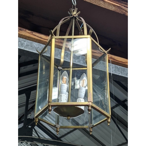 318 - HALL LANTERN, gilt metal and glazed, three branch light, 65cm H. (faults to finish)