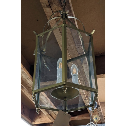 319 - HALL LANTERN, gilt metal and glazed, three branch light, 65cm H. (faults to finish)