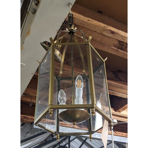 320 - HALL LANTERN, gilt metal and glazed, three branch light, 65cm H. (faults to finish)