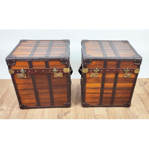 409 - TRUNKS, a pair, wooden with rising lips, 52cm x 47cm x 60cm H. (2)