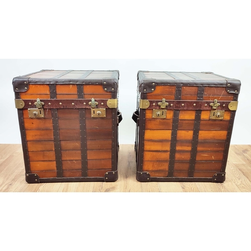 409 - TRUNKS, a pair, wooden with rising lips, 52cm x 47cm x 60cm H. (2)