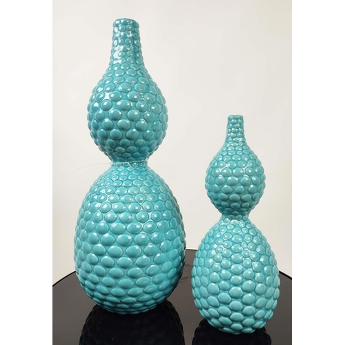 411 - TURQUOISE POTS, by Dwell Studios, two, one 48cm H, the other 33cm. (2)