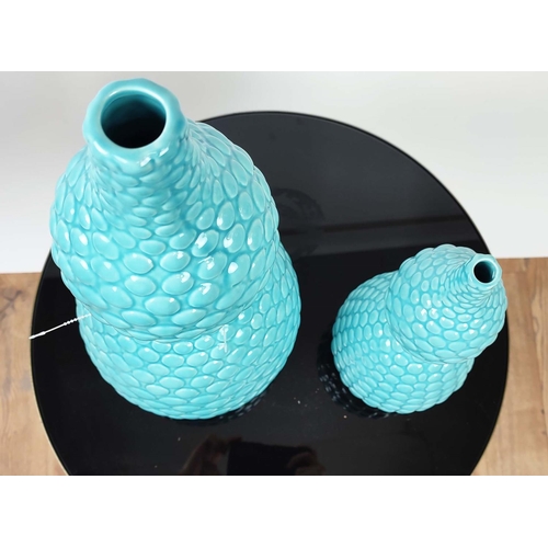 411 - TURQUOISE POTS, by Dwell Studios, two, one 48cm H, the other 33cm. (2)