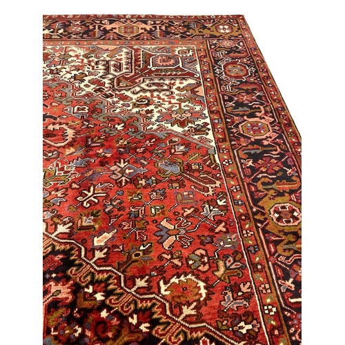 82 - FINE PERSIAN HERIZ CARPET, 340cm x 250cm.