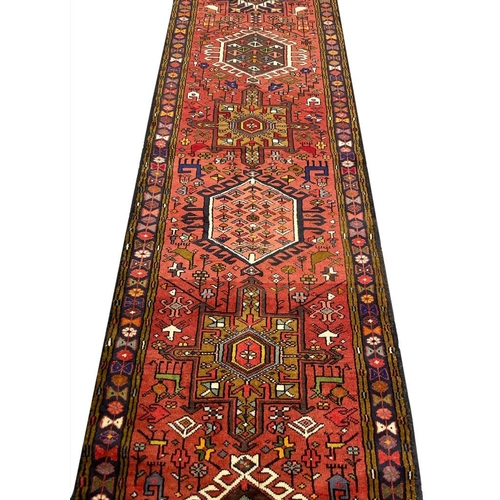 84 - PERSIAN KARAJA LONG RUNNER, 481cm x 80cm.