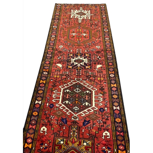 84 - PERSIAN KARAJA LONG RUNNER, 481cm x 80cm.