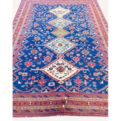 87 - ANTIQUE QASHQAI CARPET, 290cm x 200cm.