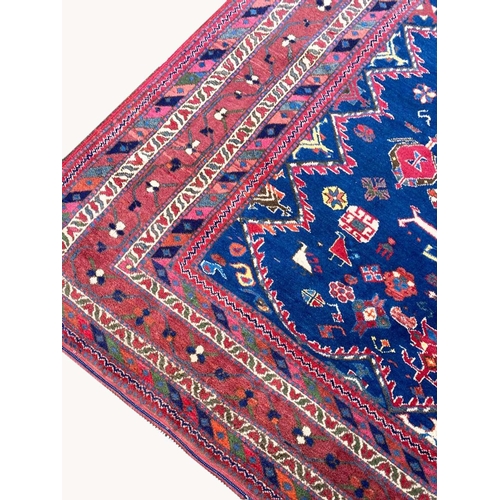 87 - ANTIQUE QASHQAI CARPET, 290cm x 200cm.