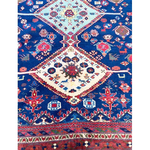 87 - ANTIQUE QASHQAI CARPET, 290cm x 200cm.