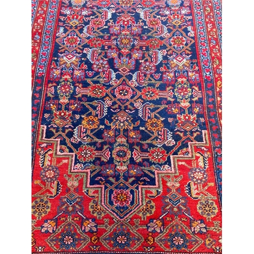 89 - ANTIQUE NORTH WEST PERSIAN RUNNER, 490cm x 103cm.