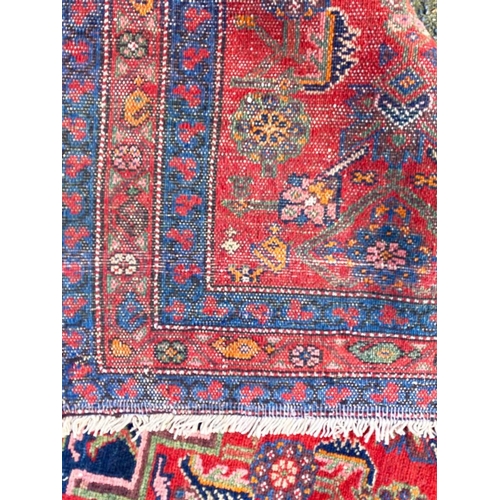 89 - ANTIQUE NORTH WEST PERSIAN RUNNER, 490cm x 103cm.