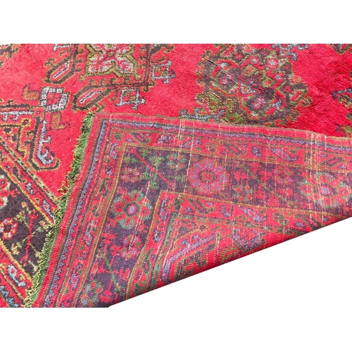 97 - ANTIQUE TURKISH OUSHAK CARPET, 395cm x 311cm.