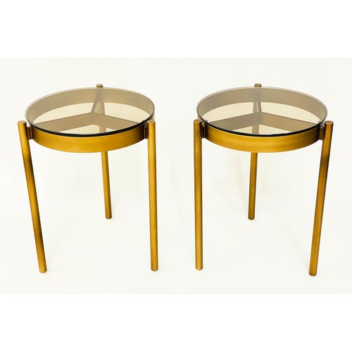 286 - SIDE TABLES, a pair, bronzed steel circular glazed each with three supports, 42cm x 59cm H. (2)