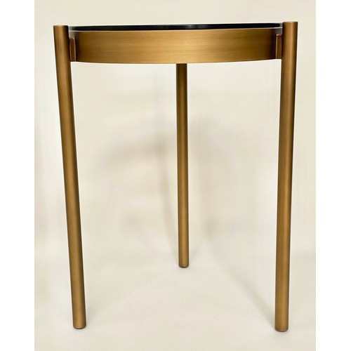 286 - SIDE TABLES, a pair, bronzed steel circular glazed each with three supports, 42cm x 59cm H. (2)