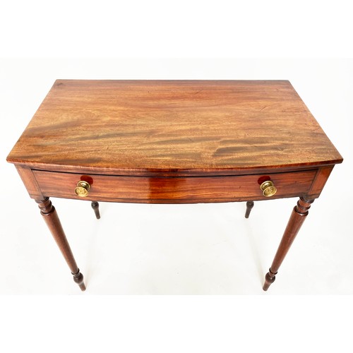 114 - BOWFRONT WRITING TABLE, George III mahogany with single full width drawer and square section taperin... 