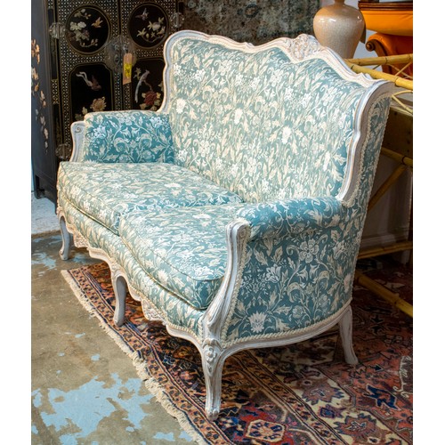 249 - CANAPE, 93cm H x 143cm, Louis XV style white painted in blue foliate fabric.