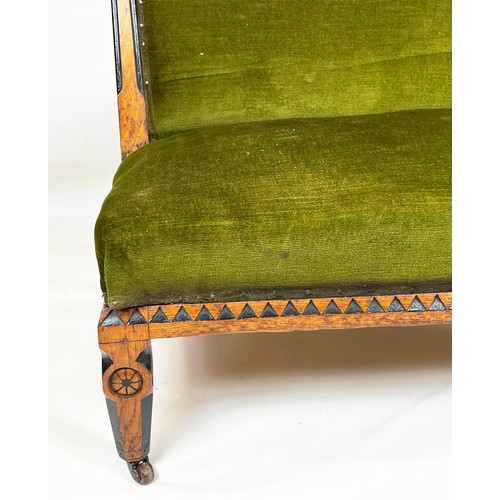 246 - BANQUETTE, 82cm H x 109cm, Victorian Aesthetic oak and ebonised in green velour on ceramic castors.