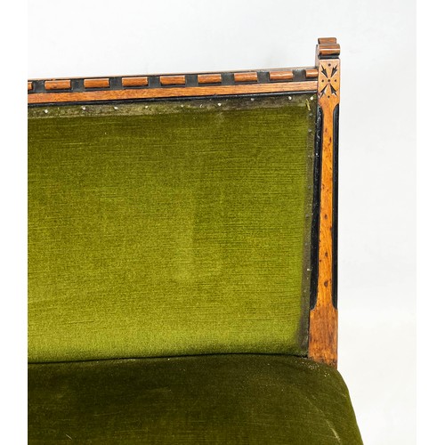 246 - BANQUETTE, 82cm H x 109cm, Victorian Aesthetic oak and ebonised in green velour on ceramic castors.