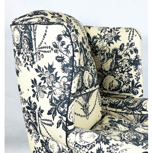 194 - WING ARMCHAIR, 118cm H x 87cm, early 20th century mahogany in cream and grey fruit patterned fabric.