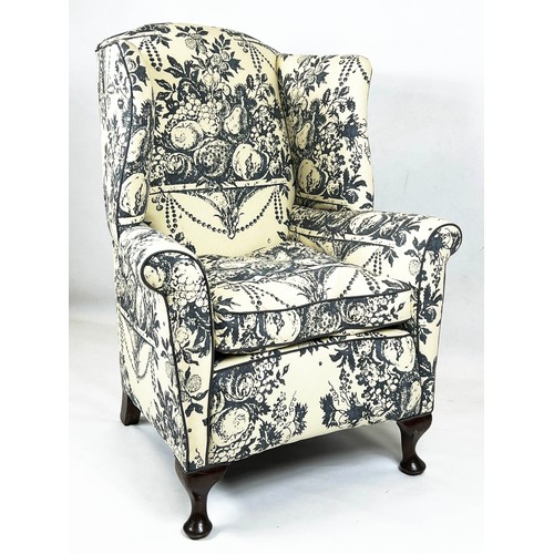 194 - WING ARMCHAIR, 118cm H x 87cm, early 20th century mahogany in cream and grey fruit patterned fabric.