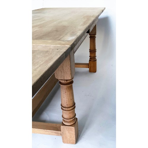 138 - DRAWLEAF REFECTORY TABLE, English refectory style oak extending with two leaves with turned pillar s... 