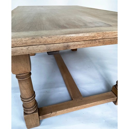 138 - DRAWLEAF REFECTORY TABLE, English refectory style oak extending with two leaves with turned pillar s... 