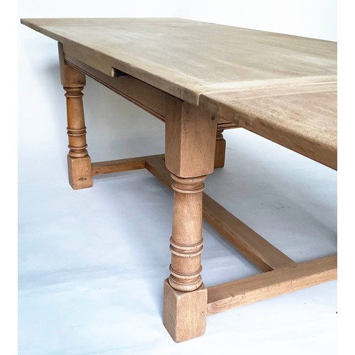 138 - DRAWLEAF REFECTORY TABLE, English refectory style oak extending with two leaves with turned pillar s... 