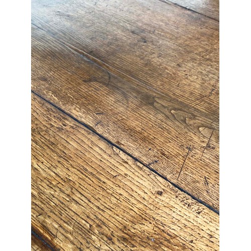 140 - FARMHOUSE TABLE, 19th century French oak with planked and cleated top, frieze drawer and square tape... 