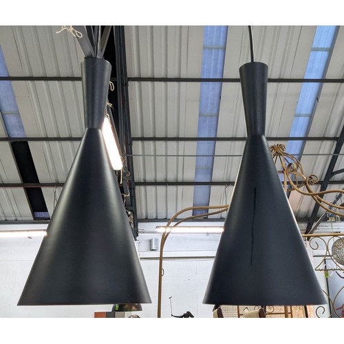 308 - PENDANT LIGHTS, a collection of five, various shapes and sizes, each black painted with gilt interio... 