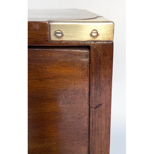 122 - BEDSIDE CHESTS, a pair, campaign style mahogany and brass bound each with three drawers, 47cm x 61cm... 