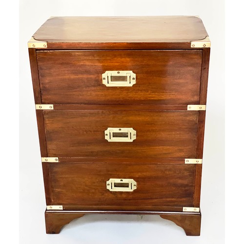 122 - BEDSIDE CHESTS, a pair, campaign style mahogany and brass bound each with three drawers, 47cm x 61cm... 