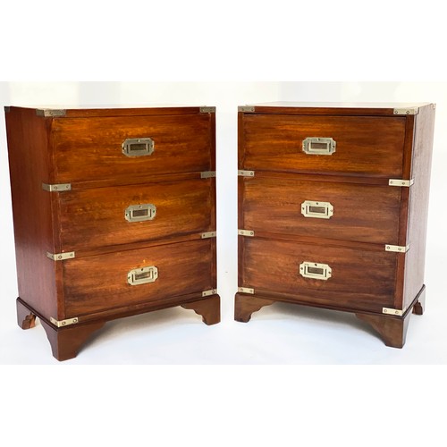 122 - BEDSIDE CHESTS, a pair, campaign style mahogany and brass bound each with three drawers, 47cm x 61cm... 