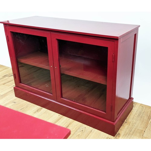 377 - CABINETS, a pair, 103.5cm x 35cm x 74cm, red painted, each with two glazed doors, shelf in each. (2)