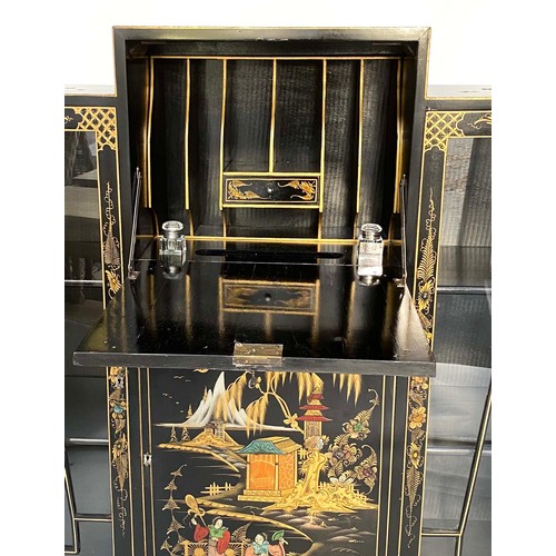 118 - ART DECO CHINOISERIE DISPLAY CABINET, 1920s lacquered and gilt decorated with fold-down fitted writi... 