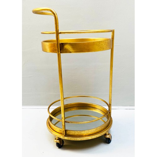 355 - COCKTAIL TROLLEY, 77cm high, 42cm diameter, 1960s French style, mirrored glass tiers, gilt metal fra... 