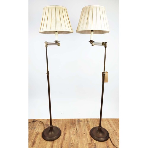 437 - READING FLOOR LAMPS, 150cm high, 40cm wide, a pair, swing arm design, gilt metal with pleated shades... 