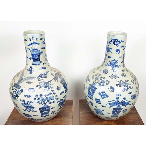 27 - BOTTLE VASES, 58cm high, a pair, Chinese Export style blue and white ceramic. (2)