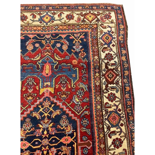 81 - ANTIQUE PERSIAN BIJAR RUG, 215cm x 125cm.