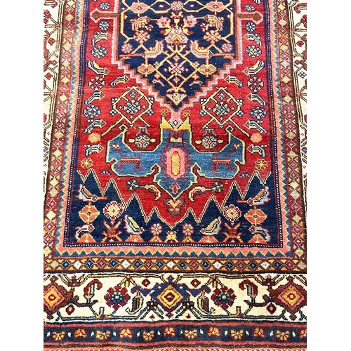 81 - ANTIQUE PERSIAN BIJAR RUG, 215cm x 125cm.